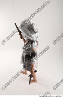 LUCI AVIOL STANDING POSE WITH TWO GUNS (22)